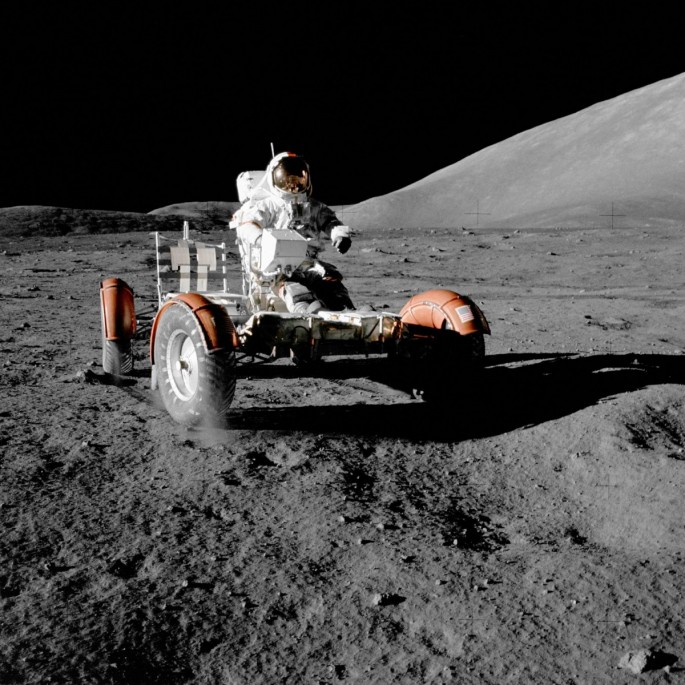 NASA astronaut Eugene A. Cernan makes a short checkout of the lunar rover during the early part of the first Apollo 17 extravehicular activity at the Taurus-Littrow landing site in this NASA handout picture