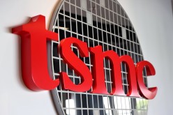 The logo of Taiwan Semiconductor Manufacturing Co (TSMC) is pictured at its headquarters, in Hsinchu, Taiwan,