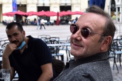 Actor Kevin Spacey sits at a caffe in Piazza San Carlo as he visits the city, where he is expected to return for a cameo appearance in a low budget Italian film,