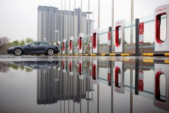 A Tesla car pictured at a charging point in Beijing, China,