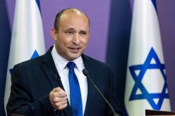 Far-right politician Naftali Bennett delivers a statement in the Knesset, the Israeli Parliament, in Jerusalem
