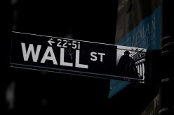 A Wall St. street sign is seen near the New York Stock Exchange (NYSE) in New York City, U.S.,