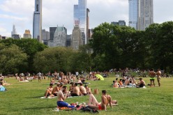 People enjoy socializing without masks in Central Park in the Manhattan borough of New York City, U.S., 