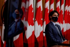 Canada's prime minister, Justin Trudeau, wearing a protective face mask, attends a news conference, as efforts continue to help slow the spread of the coronavirus disease (COVID-19)