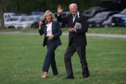 U.S. President Joe Biden and first lady Jill Biden walk to board Marine One for travel to the G7 Summit in the UK from the Ellipse at the White House in Washington, U.S.