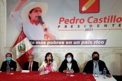 Dina Boluarte (C), running mate of Peru's presidential candidate Pedro Castillo (not pictured), addresses the media at the headquarters of the 