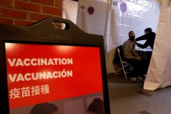 A commuter receives a shot of the Johnson & Johnson vaccine for the coronavirus disease (COVID-19) during the opening of MTA's public vaccination program at a subway station in the Brooklyn borough of New York City, 