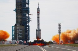 The Long March-2F Y12 rocket, carrying the Shenzhou-12 spacecraft and three astronauts, takes off from Jiuquan Satellite Launch Center for China's first manned mission 