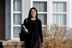 Huawei Technologies Chief Financial Officer Meng Wanzhou leaves her home to attend a court hearing in Vancouver, British Columbia, Canada