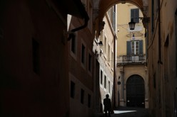 A man walks in the street as COVID-19 restrictions in the Lazio region are slightly relaxed, in Rome, Italy