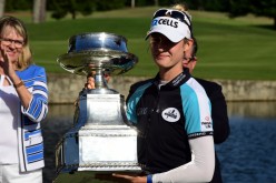 John's Creek, Georgia, USA; Nelly Korda holds the championship trophy as she celebrates winning the KPMG Women's PGA Championship golf tournament