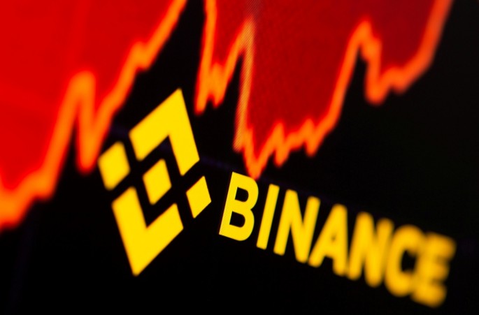 Binance logo and stock graph are displayed in this illustration taken,
