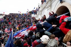 Pro-Trump protesters storm into the U.S. Capitol during clashes with police, during a rally to contest the certification of the 2020 U.S. presidential election results 