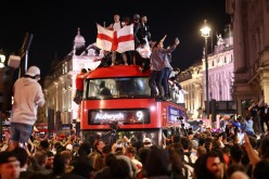 Soccer Football - Euro 2020 - Fans gather for England v Denmark - Piccadilly Circus, London, Britain