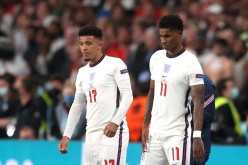 Soccer Football - Euro 2020 - Final - Italy v England - Wembley Stadium, London, Britain - July 11, 2021 England's Marcus Rashford and Jadon Sancho