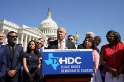 Representative Chris Turner, chair of the Texas House Democratic Caucus, joins with other Democratic members of the Texas House of Representatives,