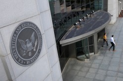 People exit the headquarters of the U.S. Securities and Exchange Commission (SEC) in Washington, D.C., U.S.
