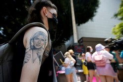 Taylor Coppage takes part in a protest in support of pop star Britney Spears on the day of a conservatorship case hearing at Stanley Mosk Courthouse in Los Angeles, California, U.S.