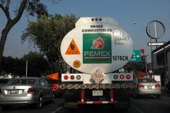 A tanker truck transporting fuel is pictured along the streets en route to a gas station, in Mexico City, Mexico