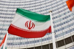 FILE PHOTO: The Iranian flag waves in front of the International Atomic Energy Agency (IAEA) headquarters,