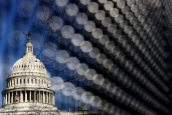 Light catches the security fence around the U.S. Capitol, erected in the wake of the January 6th attack but now scheduled to start being removed, in Washington, U.S.