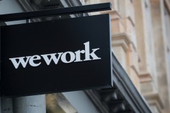 The WeWork logo is displayed outside of a co-working space in New York City, New York
