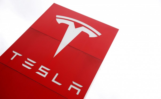 The logo of car manufacturer Tesla is seen at a dealership in London, Britain,
