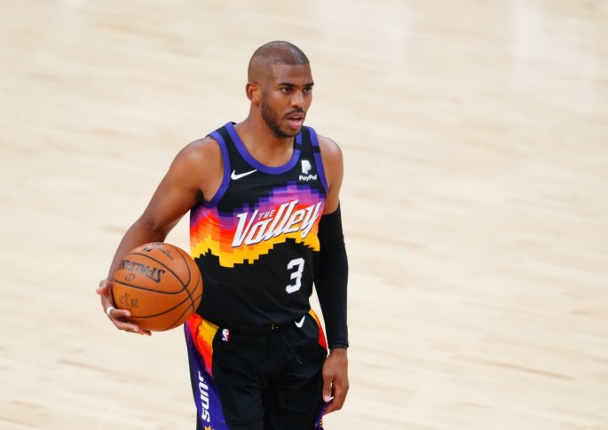 Jul 6, 2021; Phoenix, Arizona, USA; Phoenix Suns guard Chris Paul (3) against the Milwaukee Bucks during game one of the 2021 NBA Finals 