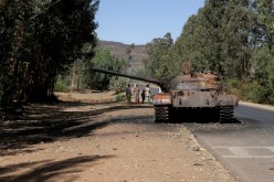A burned tank stands near the town of Adwa, Tigray region, Ethiopia, 