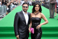 Bollywood actress Shilpa Shetty and husband Raj Kundra (R) arrive on the green carpet during the International Indian Film Academy (IIFA) Awards in Toronto