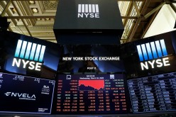 Screens display trading information over the floor of the New York Stock Exchange (NYSE) in New York, U.S