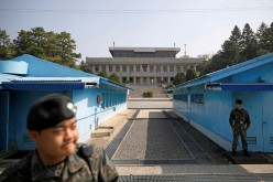 South Korean soldiers stand guard at the truce village of Panmunjom inside the demilitarized zone (DMZ) separating the two Koreas, South Korea