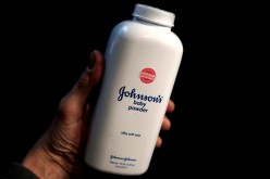 A bottle of Johnson and Johnson Baby Powder is seen in a photo illustration taken in New York, 