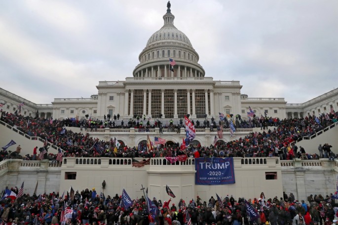 A mob of supporters of U.S. President Donald Trump storm the U.S. Capitol Building in Washington, U.S.