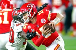 Feb 7, 2021; Tampa, FL, USA; Kansas City Chiefs quarterback Patrick Mahomes (15) is pressured by Tampa Bay Buccaneers outside linebacker Jason Pierre-Paul (90) during the fourth quarter in Super Bowl LV at Raymond James Stadium.