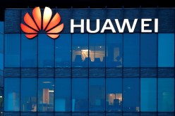 A view shows a Huawei logo at Huawei Technologies France headquarters in Boulogne-Billancourt near Paris, France