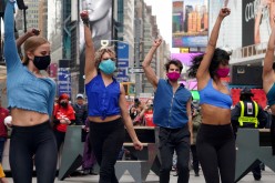 Performers take part in a pop up Broadway performance in anticipation of Broadway reopening in Times Square amid the coronavirus disease (COVID-19) pandemic in the Manhattan borough of New York City, 
