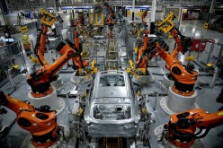 Autonomous robots assemble an X model SUV at the BMW manufacturing facility in Greer, South Carolina, U.S