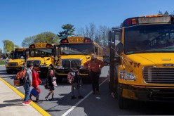 Students are led onto the bus after the school day ends at Kratzer Elementary School in Allentown, Pennsylvania, U.S.,
