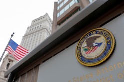 The seal of the United States Department of Justice is seen on the building exterior of the United States Attorney's Office of the Southern District of New York in Manhattan