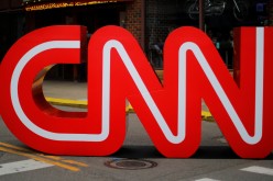 The CNN logo stands outside the venue of the second Democratic 2020 U.S. presidential candidates debate, in the Fox Theater in Detroit, Michigan, U.S.