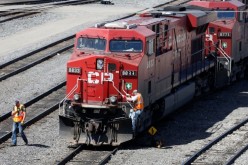 A Canadian Pacific Railway crew works on their train at the CP Rail yards in Calgary,
