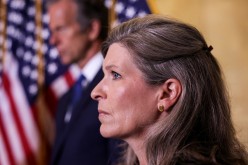U.S. Senator Joni Ernst (R-IA) and John Thune (R-SD) face reporters after the weekly Senate Republican caucus policy luncheon on Capitol Hill in Washington, U.S., 