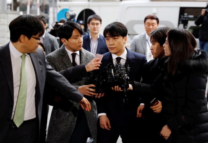 Seungri, a member of South Korean K-pop band Big Bang, arrives to be questioned over a sex bribery case at the Seoul Metropolitan Police Agency in Seoul, South Korea,