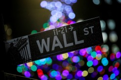 The Wall St. sign is seen outside the New York Stock Exchange (NYSE) in New York, U.S.