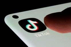 TikTok app is seen on a smartphone in this illustration taken