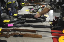 A dealer displays firearms for sale at a gun show in Kansas City, Missouri