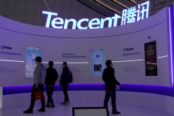 A logo of Tencent is seen during the World Internet Conference (WIC) in Wuzhen, Zhejiang province, China,
