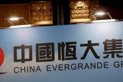 A logo of China Evergrande Group is displayed at a news conference on the property developer's annual results in Hong Kong, China