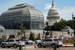 U.S. Capitol Police vehicles and other emergency vehicles respond as police investigated reports of a suspicious vehicle near the U.S. Capitol in Washington, U.S.,
